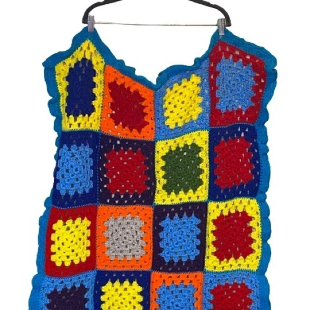 Hand crocheted bright multi colored Afghan size 56” X 31”